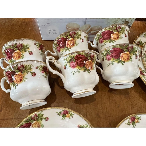 1573 - Royal Albert 'Old Country Roses' including cups, saucers, side plates, etc.  Approx. 50 pieces.