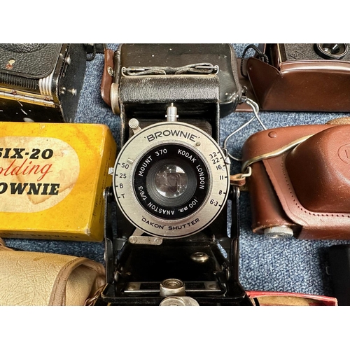 1151A - Camera Interest - a large bag of assorted camera related items, including Kodak, Phillips, Ensign, A... 