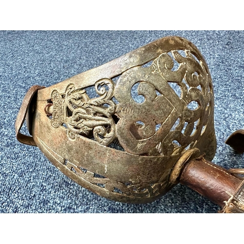 1306 - A WWI British Infantry Officer's Sword, Henry Wilkinson hilt, with leather scabbard, etched blade, a... 