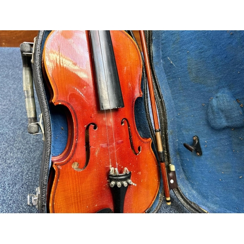 1365 - Collection of Muscal Instruments, to include two macine made violins in hard cases and two Clarinets... 