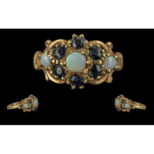 142 - Ladies Attractive 9ct Gold Opal and Sapphire Set Dress Ring, full hallmark to interior of shank, the... 