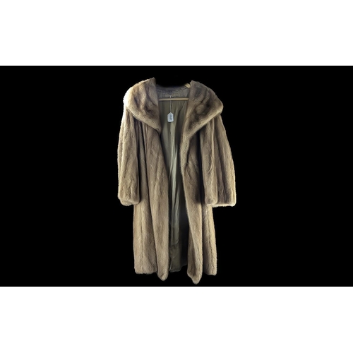 1521 - Ladies Mink Coat, full length, golden brown colour, collar and reveres, hook and eye fastening, slit... 