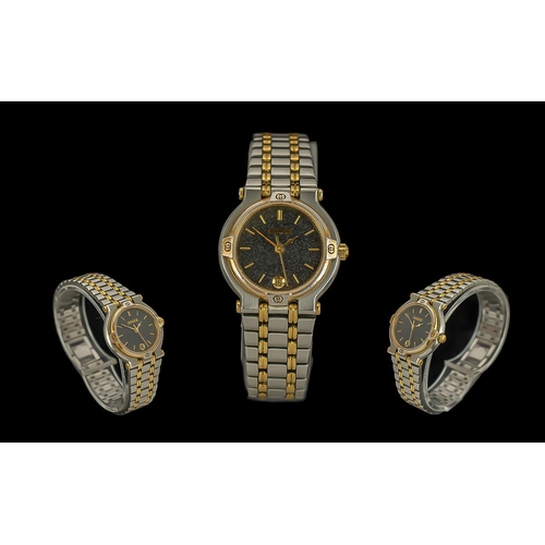 161 - Gucci - Ladies Gold Tone and Steel Quartz Wrist Watch, Boxed, Ref 900 L. Features Black Textured Dia... 