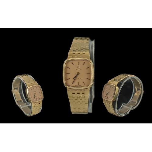 197 - Omega - Pleasing Ladies 9ct Gold Wrist Watch with Integral 9ct Gold Bracelet. c.1970's. Champagne Di... 