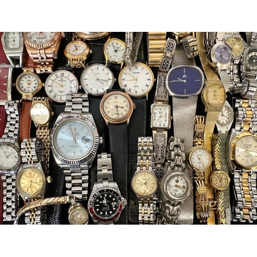 435 - Large Collection of Ladies & Gentleman's Wristwatches, leather and bracelet straps, assorted makes a... 