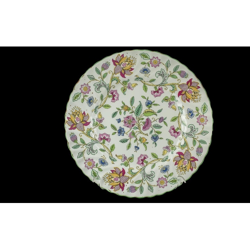 606 - A Minton Haddon Hall Cabinet Plate 10.5 inches in diameter. Together with a Minton cruet set in fitt... 