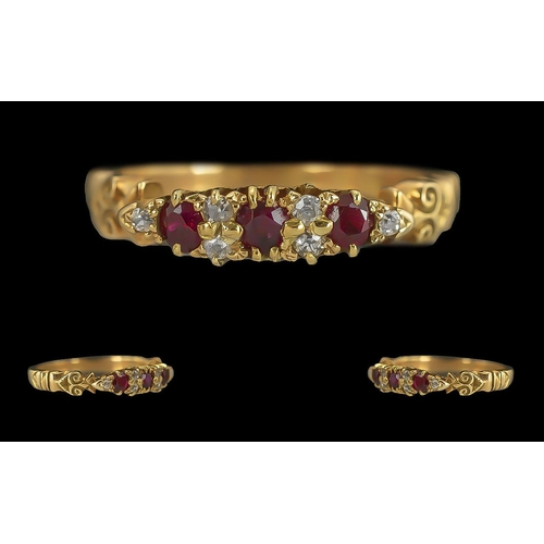 95 - Ladies 18ct Gold Pleasing Diamond and Ruby Set Ring with ornate raised setting, marked 18ct to inter... 