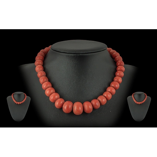 An Early 20th Century Graduated Beaded Coral Necklace with Matched and