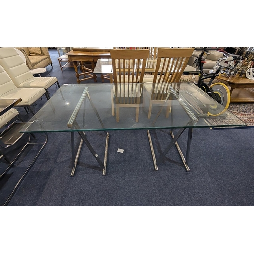 1043 - Zevi Dining Table, glass top, chrome supports, measures 26'' high x 58'' length x 31'' wide.  Togeth... 