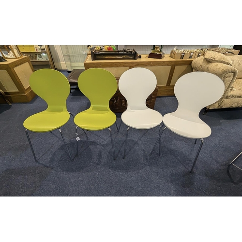 1052 - Four Bent Plywood Retro Style Scandi Chairs, two green and two white, with chrome legs.