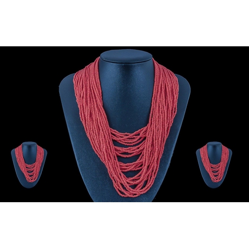 137 - Superb Coral Multi Strand Beaded Necklace, of wonderful colour, with large and impressive clasp, cir... 