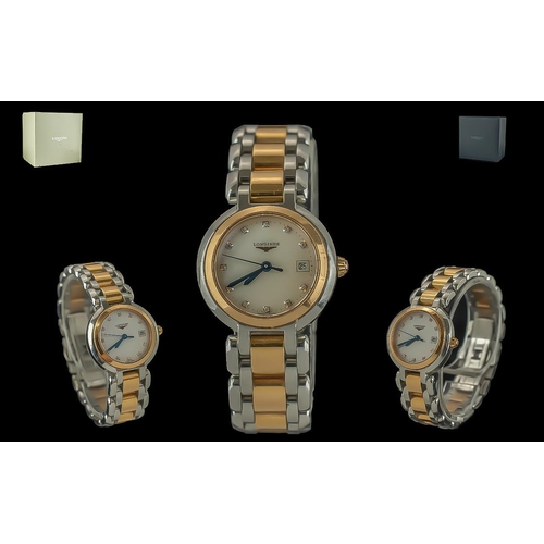 153 - Longines Prima Luna Ladies Gold Tone and Steel Quartz Wrist Watch, features diamond set markers and ... 