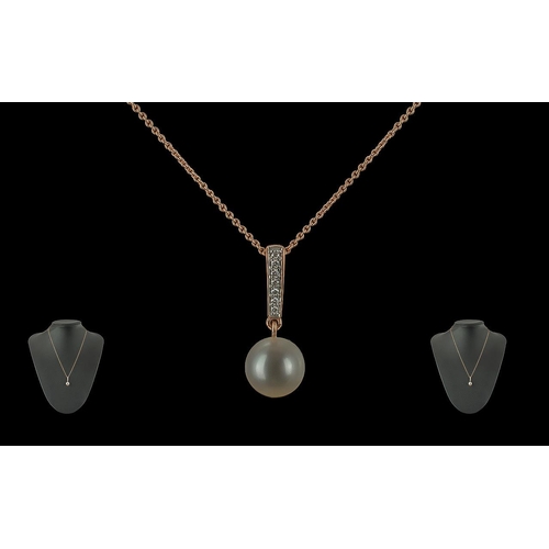 157 - 9ct Rose Gold Freshwater Pearl Pendant with tapered diamond bale on a 9ct rose gold chain, boxed. Ro... 