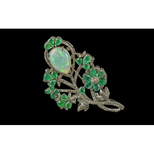 169 - Foliate Bar Pin Brooch Set with a cabochon pear shaped opal, pear-shaped emeralds and diamonds, in s... 