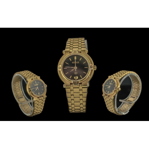 170 - Gucci - Ladies Gold on Steel Fashion Quartz Watch, Features Black Dial, Gold Markers and Extra Links... 