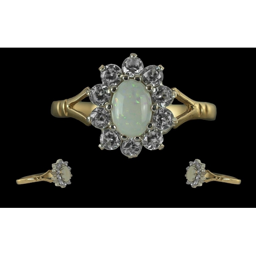 204 - Ladies Attractive 9ct Gold Opal and CZ Set Cluster Ring. Full Hallmark to Interior of Shank. The Cen... 