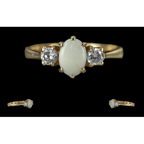 263 - Ladies - Attractive 9ct Gold 3 Stone Diamond and Opal Ring, Full Hallmark to Interior of Shank. The ... 