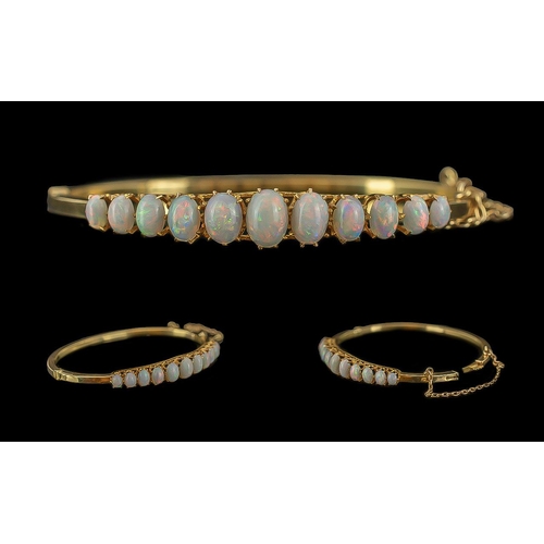 29 - Victorian Period 1837 - 1901 Ladies 15ct Gold Opal Set Hinged Bangle with Safety Chain. Marked 15ct.... 