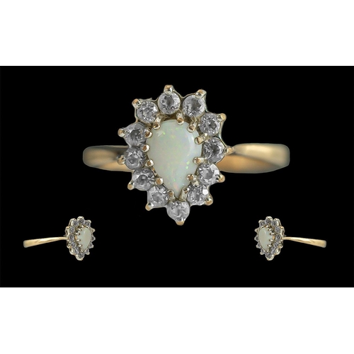 342 - Ladies 9ct Gold Opal and CZ Set Cluster Ring, Full Hallmark to Interior of Shank. The Central Opal o... 