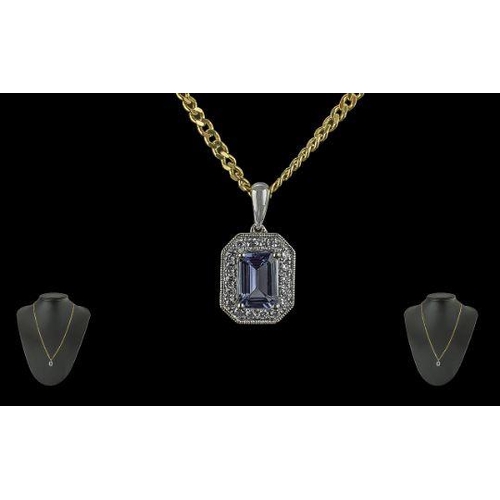 356 - Ladies 18ct White Gold Diamond and Tanzanite Set Pendant. Marked 750 - 18ct. With Attached 9ct Gold ... 