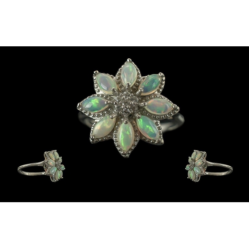 357 - Attractive Quality Opal Floral Ring, the flower comprising eight marquise cut opal cabochons, with g... 