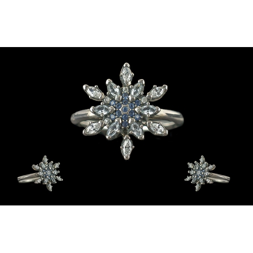 393 - Two Pandora Silver Rings, both in original boxes, consisting an icicle star shaped dress ring size L... 