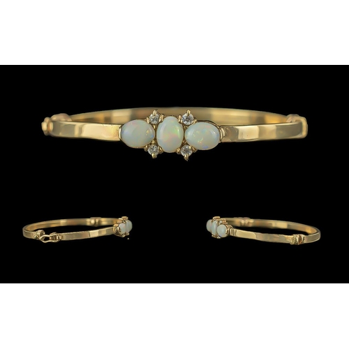 45A - Antique Period Ladies - Pleasing Quality 9ct Gold Opal and Diamond Set Hinged Bangle. The Bangle of ... 