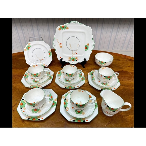 648 - Art Deco Style Tea Service, Pattern No. 220255, comprising five cups, five saucers, six octagonal si... 