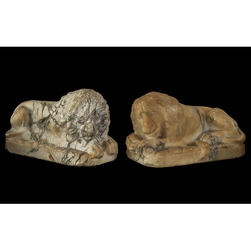 714 - Two Small Antique Marble Lion Figures, depicts recumbent lions, measure 4.5'' wide x 3'' tall.