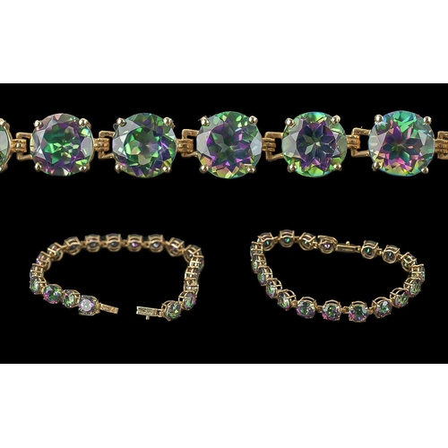 54 - Ladies - Attractive 9ct Gold Mystic Topaz Set Line Bracelet, Marked 9.375. Set with Well Matched Mys... 