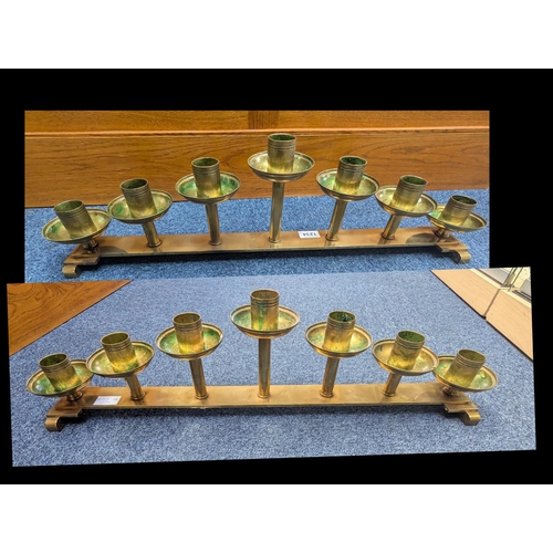 1234 - Two Arch Brass Candle Holders, Art Deco style, each holds seven candles.  29'' length.