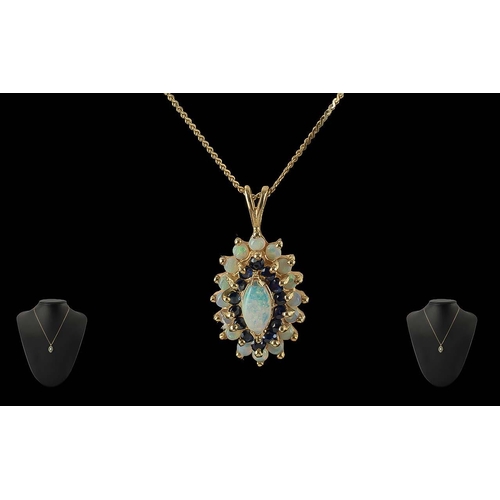 340 - Ladies 9ct Gold Opal and Garnet Set Pendant and Attached 9ct Gold Chain, Both Marked for 9ct. Length... 