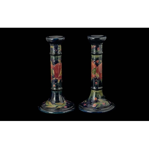 518 - William Moorcroft Signed Pair of Candlesticks Hand Painted In the Pomegranate / Berries Design. c.19... 