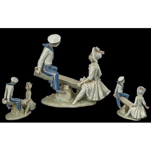 522 - Lladro Hand Painted Porcelain Figure Group ' Sea-Saw ' Boy and Girl on Sea-saw, Model No 1255. Desig... 