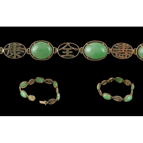 70 - Ladies 14ct Gold and Jade Set Bracelet, Marked 14ct. The Well Matched Cabouchon Cut Jade Stones of G... 