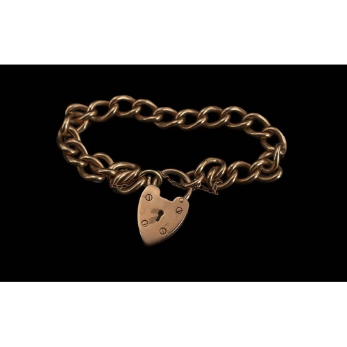 70A - Ladies or Gents 9ct Gold Curb Bracelet with Heart Shaped Padlock. Marked 9.375 to Links, Warm Gold C... 