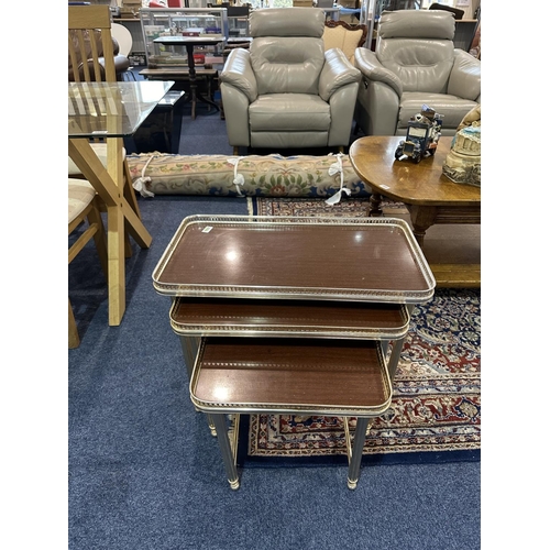 1037 - Nest of Three Tables 60's style, brown formica style top with raised filigree metal edging and metal... 