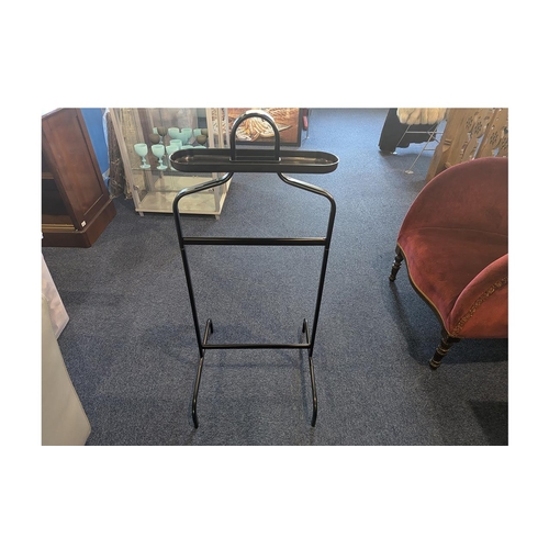 1039 - Four Pieces of Black Framed Furniture, to include a circular table, fold up table, large over mantle... 