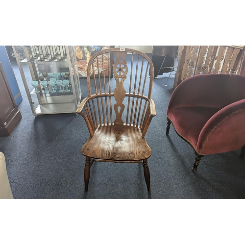 1041 - Windsor Chair Armchair, spindle back of typical form, with low seat.  Height 14''.