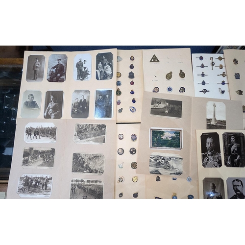 1302 - Collection of Militaria, comprising cloth badges, military photographs and postcards, together with ... 