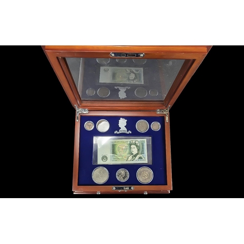 361 - Danbury Mint The Queen Elizabeth II Commemorative Set In Fitted Deluxe Chest With paperwork.