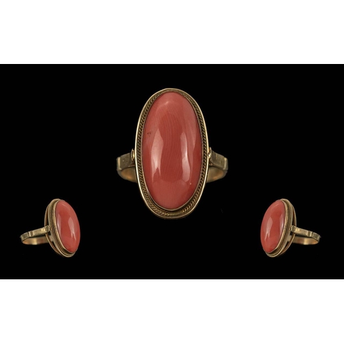 92A - Ladies 14ct Gold Single Stone Coral Set Ring, Marked 14ct to Interior of Shank. The Elongated Oval S... 