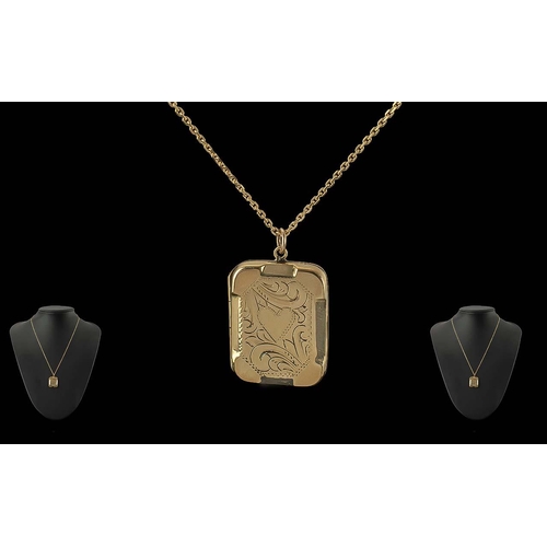 412A - 9ct Gold Front & Back Locket Suspended on a 9ct Chain, locket engraved with heart design.