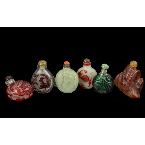 814 - Six Hardstone Cameo Style Snuff Bottles.