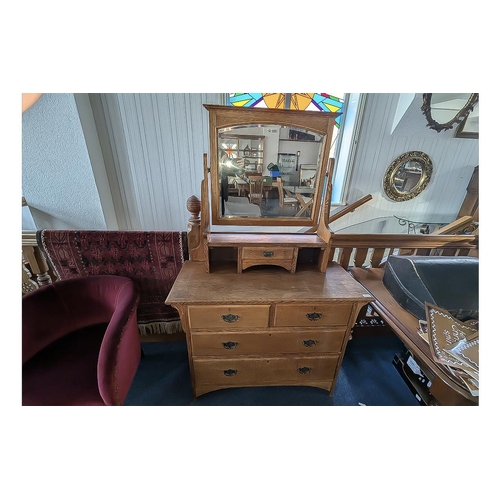 1032 - Late 19/20th Century Golden Oak Dressing Table, two short over three long drawers, swivel mirror top... 