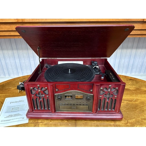 1044 - Retro Style Prolectrix Turntable, AM/FM Radio with CD and Cassette Player, mahogany coloured finish,... 