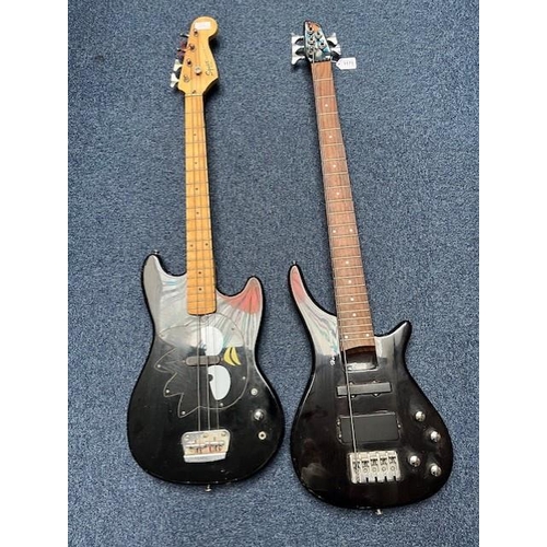 1175 - Guitar Interest - Two Guitars, comprising a Harley Benton black guitar, needs re-stringing, and a Sq... 