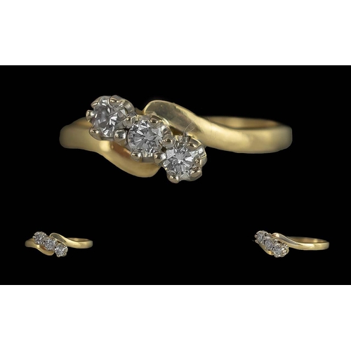 128 - 18ct Gold Three Stone Diamond Twist Ring, est. diamond size 0.33 ct.  Weight 3.69 grams.  Ring size ... 