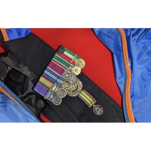 1306 - Large Wood Banded Suitcase containing formal military uniforms.