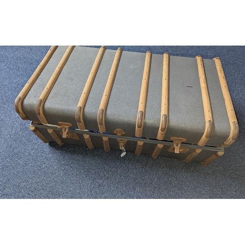 1306 - Large Wood Banded Suitcase containing formal military uniforms.